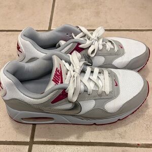 Nike Gray and White Sneakers with Pink Highlights